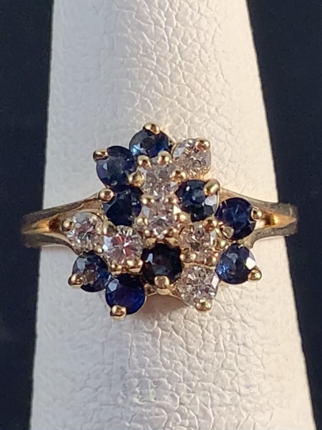 9 Blue Sapphire & 7 Diamond Cocktail Ring
Diamond total approximately .40 caratst and
Sapphires total approximately .70 carats.
Size 4.75. Can be sized up to 6.5

$590