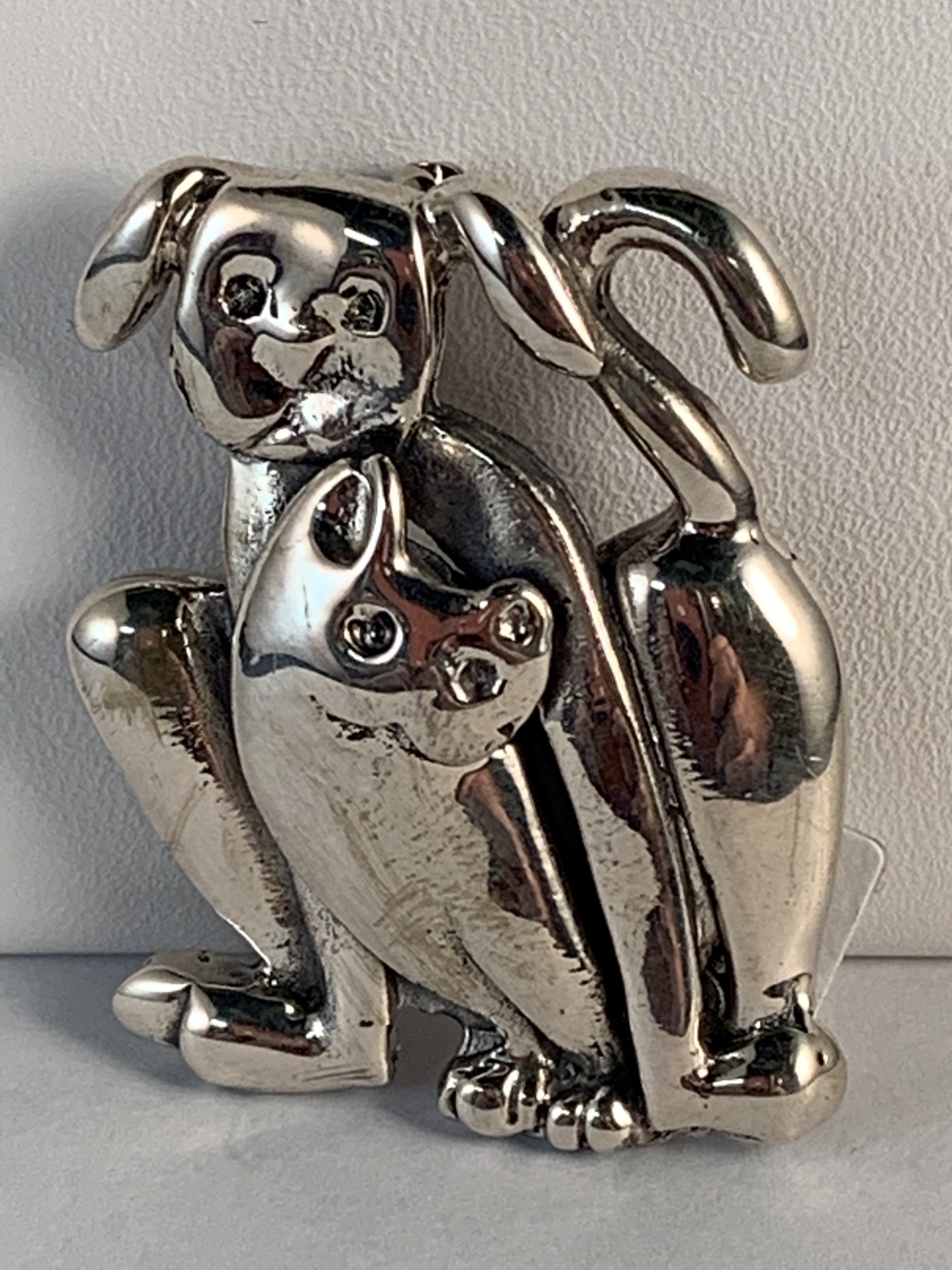 Dog & Cat Pin
Sterling Silver
1.5\" X 1.5\"
$49