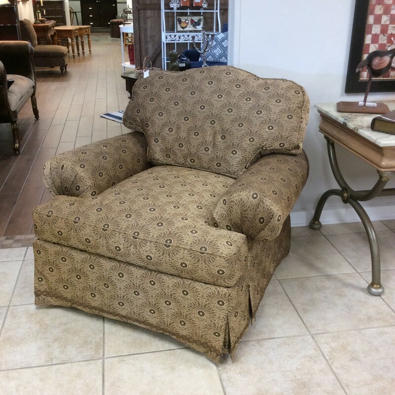 Over-sized and a little over-stuffed this chair by Massoud is gorgeous! It features rolled arms, is skirted and upholstered in a lovely  black, brown and beige delicate floral patten. Perfect condition, appears to have never been used in fact.