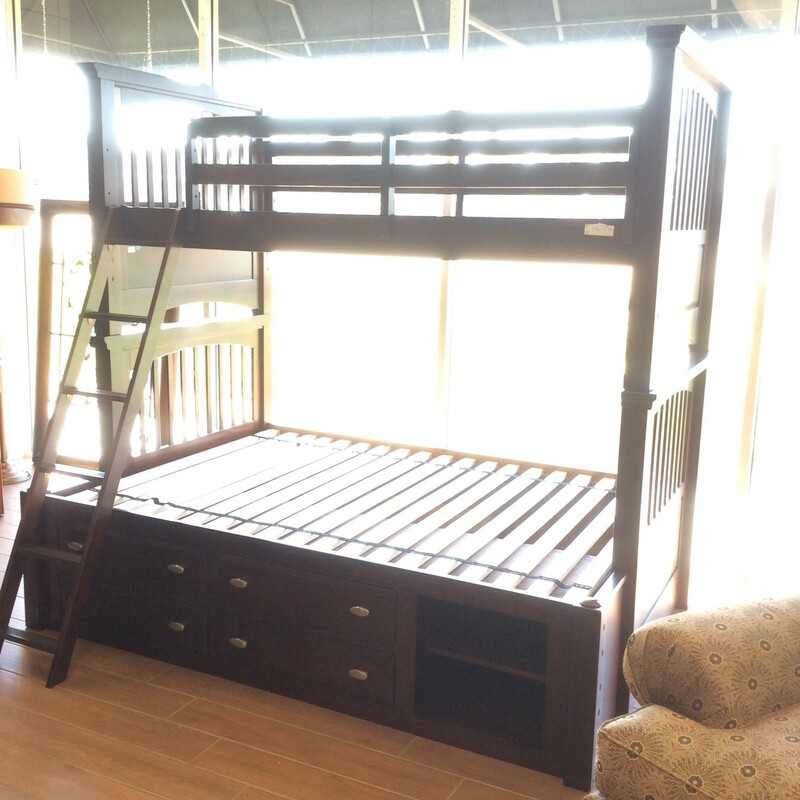 This very sturdy bunk bed is a twin and full size. It has a ladder and storage.
Measures 81x57x72