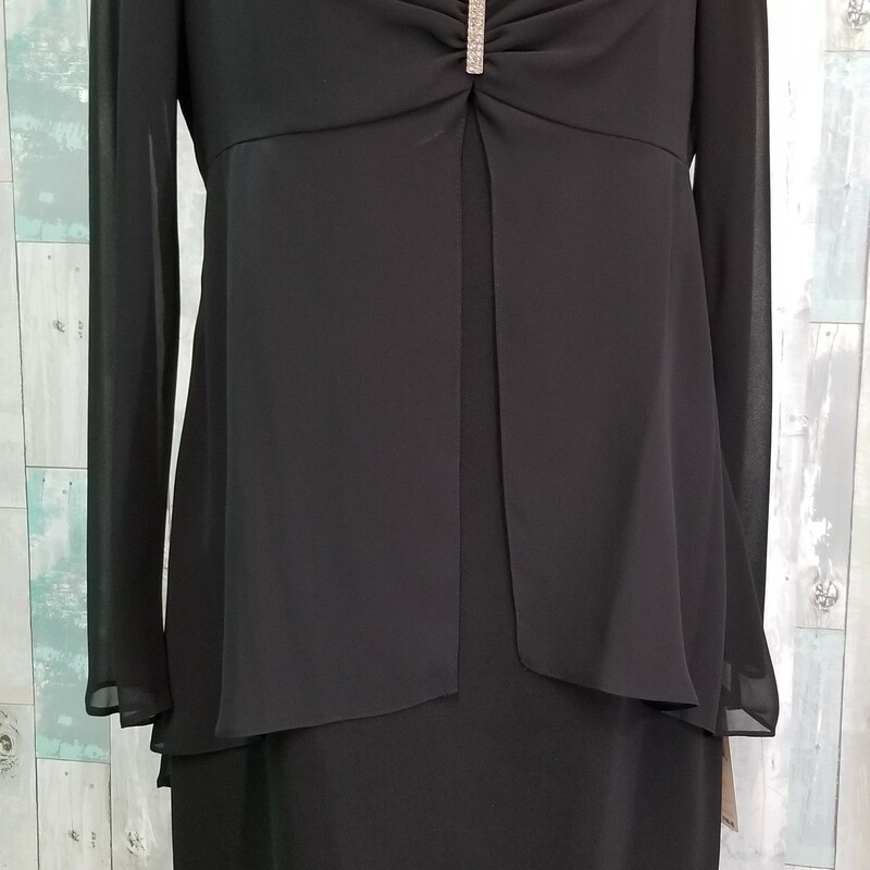 NEW Evan Picone formal. This dress is all one piece, fully lined with sheer sleeves and a cute rhinestone adornment.
 Black
Size: 12