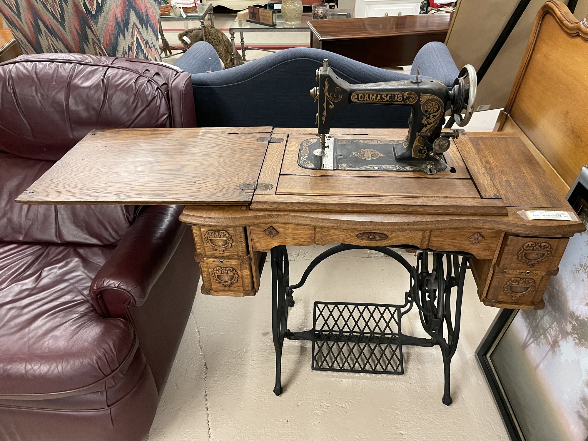 Antique Damascus sewing machine and table
We are unsure of the age but the manual is in the drawer, see the photo!
The table is in excellent condition!
Size: 30H/36W/19D
IN STORE PICK UP ONLY
