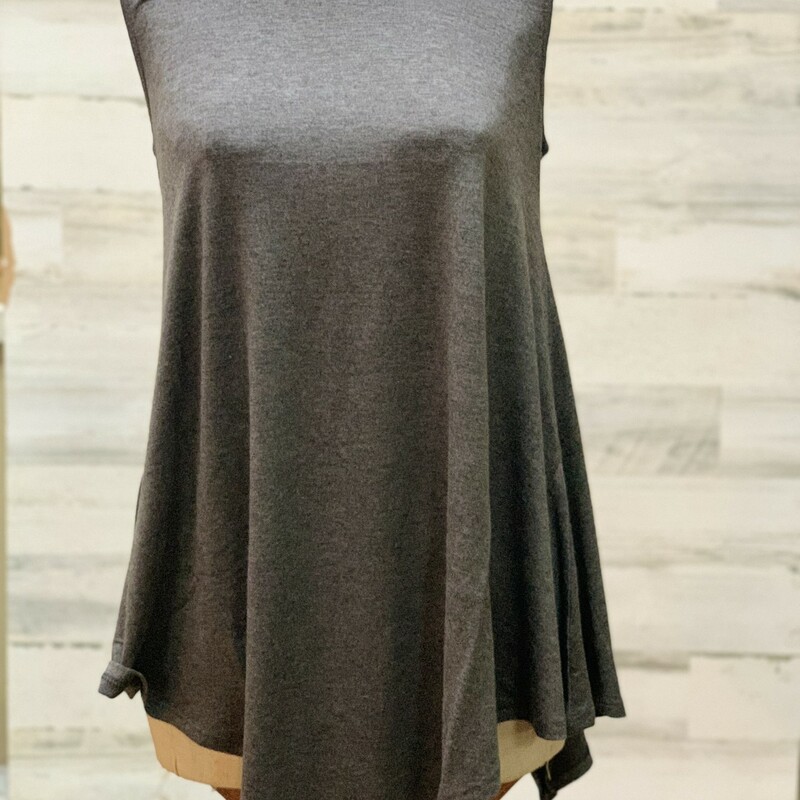 Charcoal  V Tank size XL. These pair so cute with Jeans or Shorts during the summer months. Dress it up with a cute kimono or cardigan for cooler weather. Perfect for a casual night in, or date night on the town! Short Sleeve. Made of 57% polyester, 38% Rayon, and 5% spandex.