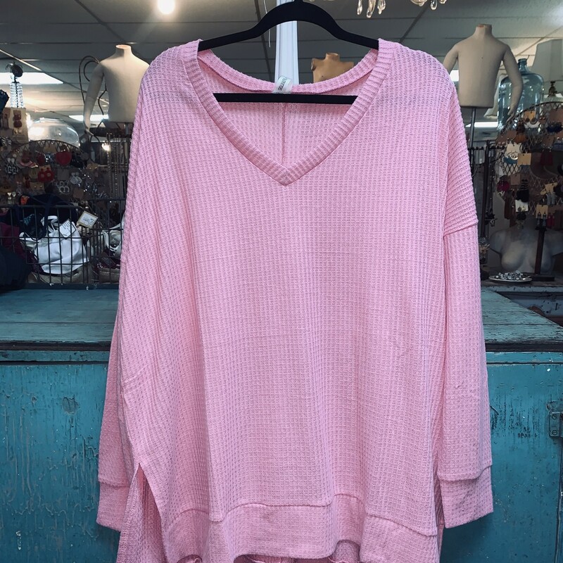 Bubblegum Waffle Knit Sweater Plus Size 1X. These pair so cute with Jeans or Leggings. Personally, I use these as a pullover during cool weather- over T-shirts when I am keeping it casual, and then I add a ruffle slip or dress underneath it when I want to dress it up.This Item is Long Sleeve. Made of 59% polyester, 38% Rayon, and 3% spandex.