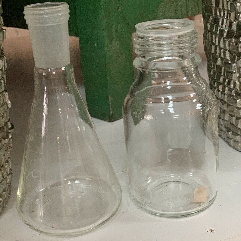 These glass chemistry beakers are out of a textile mill local to Lanett, AL. the styles vary but all hold the same amount. When ordering be sure to note the style you would like.