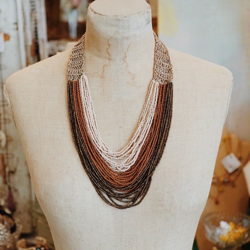 Who else absolutely loves earth tones? The earthy blush, rust, and olive colors on this necklace are to die for!