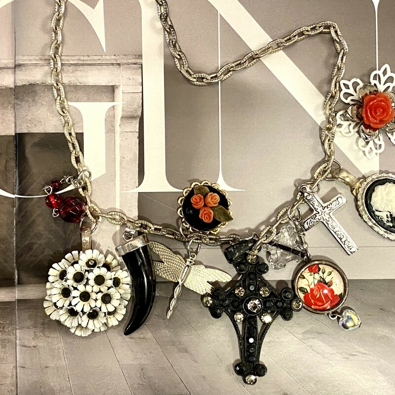 This is the perfect way to show your Falconâ€™s team spirit. This necklace is made with red; white and black vintage pieces. Itâ€™s a one of a kind piece and definitely a conversation piece.