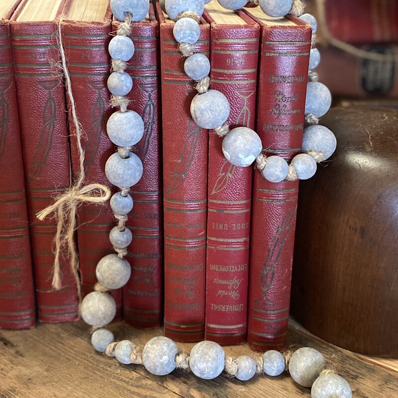 This strand of grey colored beads almost take on a stone apperance and are simply gorgeous and will add a special touch to anything in your home. This strand measures 42 inches in length