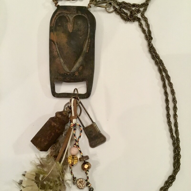 Rustic; boho; Gypsy Handmade necklace with vintage objects including; heart; peace sign; feathers and more