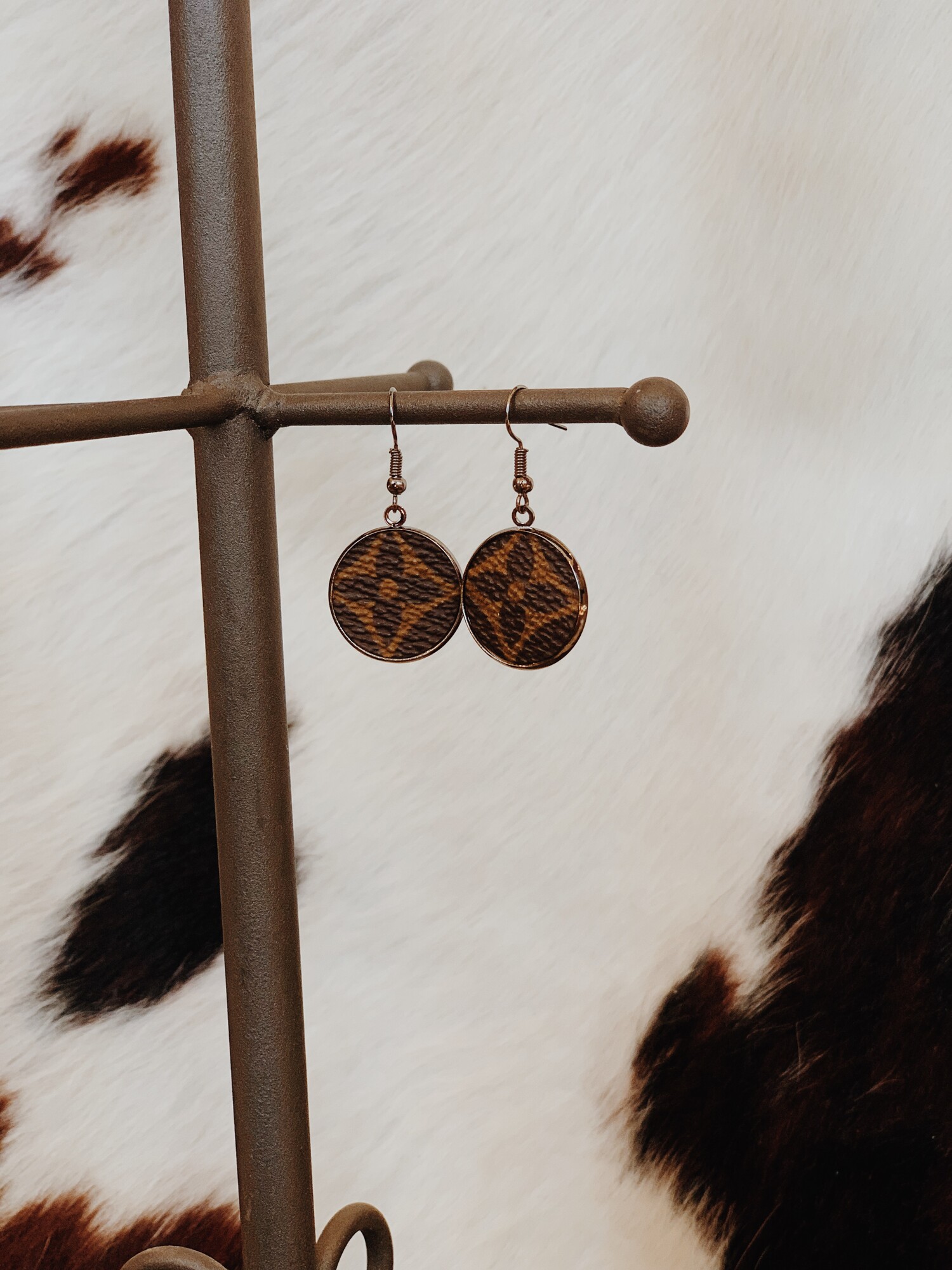 These adorable upcycled, handmade earrings were made from an authentic Louis Vuitton bag. The bag's date code is SP0927.

Resurrect Antiques is not affiliated with the LV company.