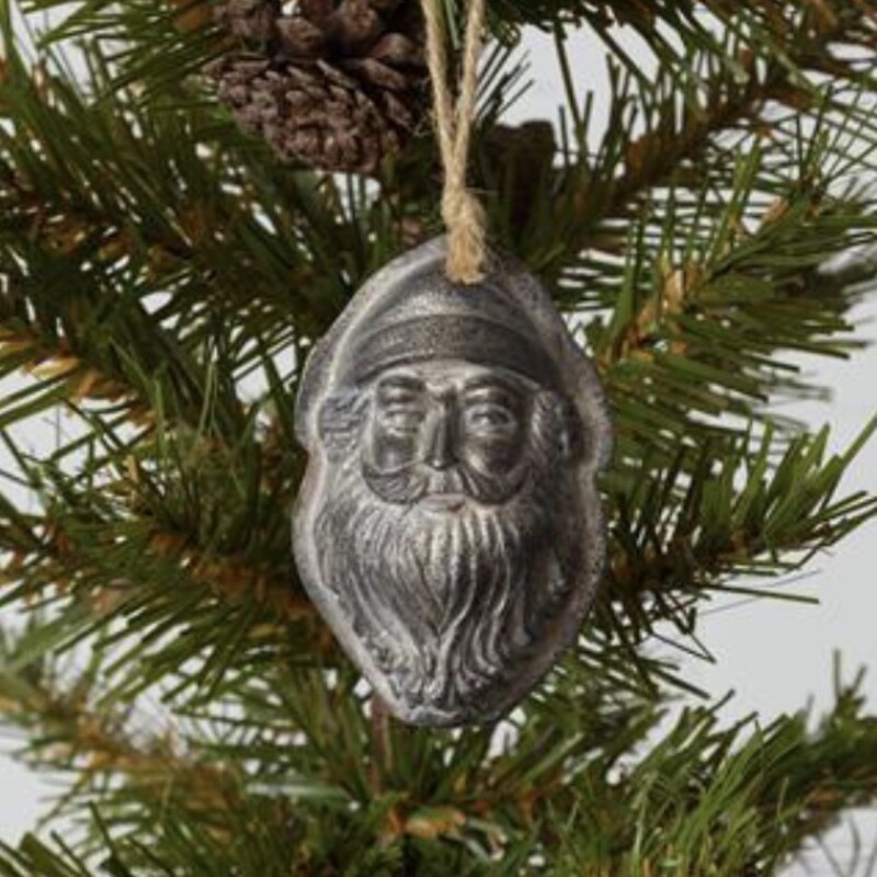 This adorable ployresin santa mold ornament would be a cute addition to your holiday tree. It measures 3.5 inches by 2.5 inches