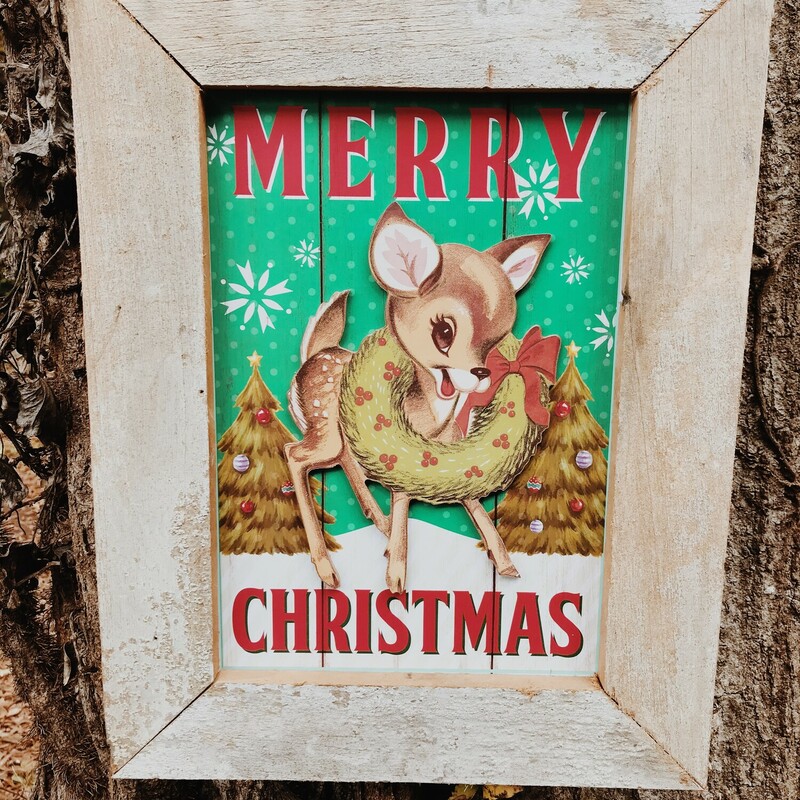 Rudolph framed in old chippy white beadboard is sure to bring magic to your home! It measures 17 x 13.