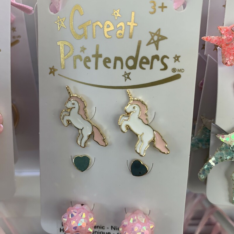 Unicorn lovers unite! This set of 3 earrings includes a pair of white and pink unicorn earrings, rose gold-coloured hearts and a pair of spunky pink studs!