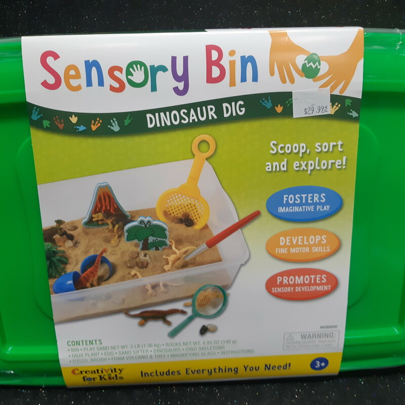 This dinosaur-themed sensory bin is perfect for helping your young learners foster imaginative play and develop fine motor and sensory skills. The kit includes everything they'll need to scoop, sort, and explore.

Details:
Green case
14.56in x 10.24in x 4.75in (36.98cm x 26cm x 12cm) bin size
Includes everything you'll need
For ages 3 and up
Contents:
Bin
Play sand 3 lb. (1.36 kg)
Rocks 4.93 oz. (140 g)
Faux plant
Egg
Sand sifter
Dinosaurs
Dino skeletons
Fossil brush
Foam volcano and tree
Magnifying glass
Instructions
jump