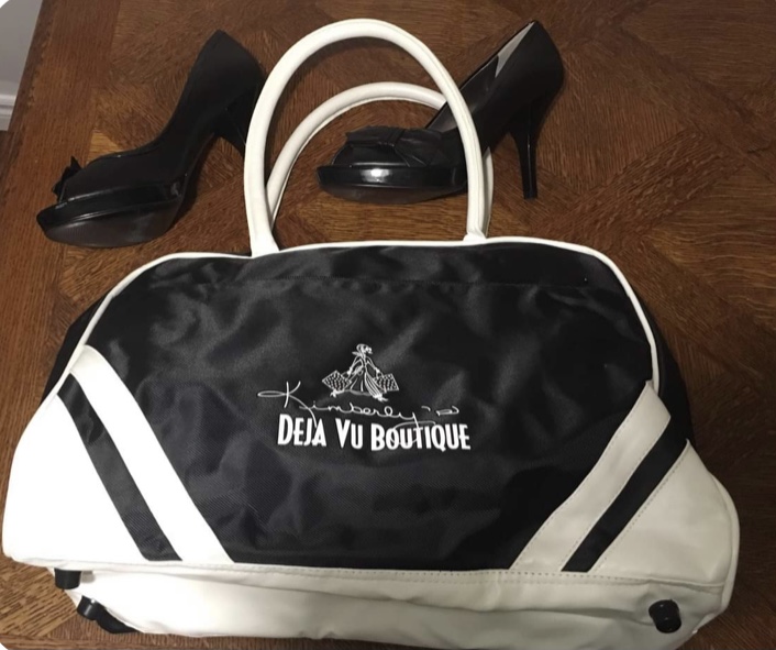 Show your love of consignment shopping at DeJa Vu Boutique with this Awesome Retro Duffle Bag Black with white logo. Great for gym stuff OR to bring your consignments into DeJa Vu!