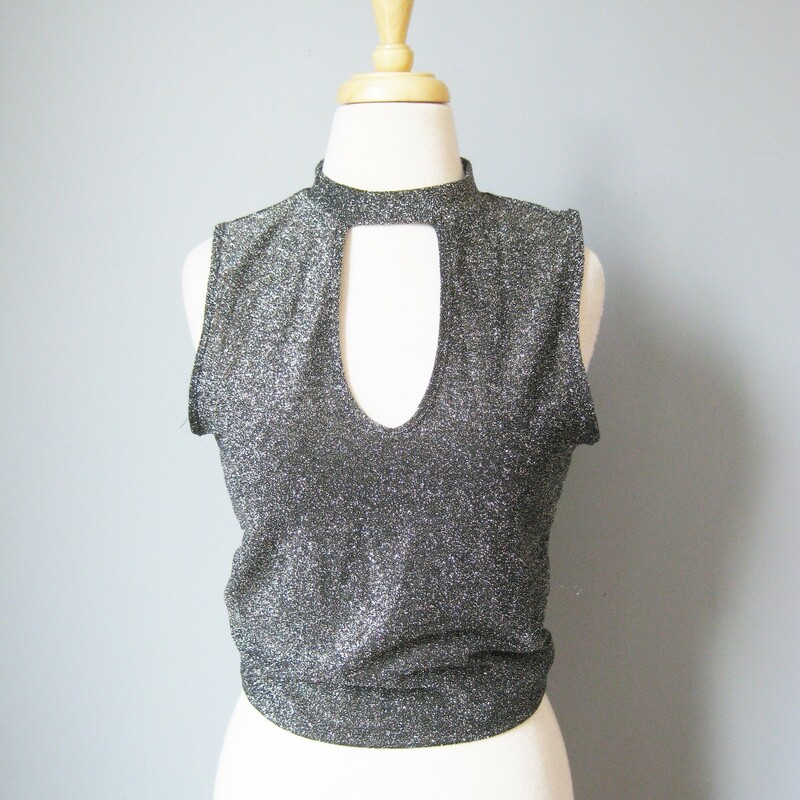 Gaze Glitter Keyhole, Silver, Size: Small
Silver Black top with a keyhole cutout
size small
flat measurements:
armpit to armpit: 17.5in
width at hem: 14.25in
length: 20in

90% poly
10% spandex, stretchy!

excellent condition
thanks for looking!
#40192