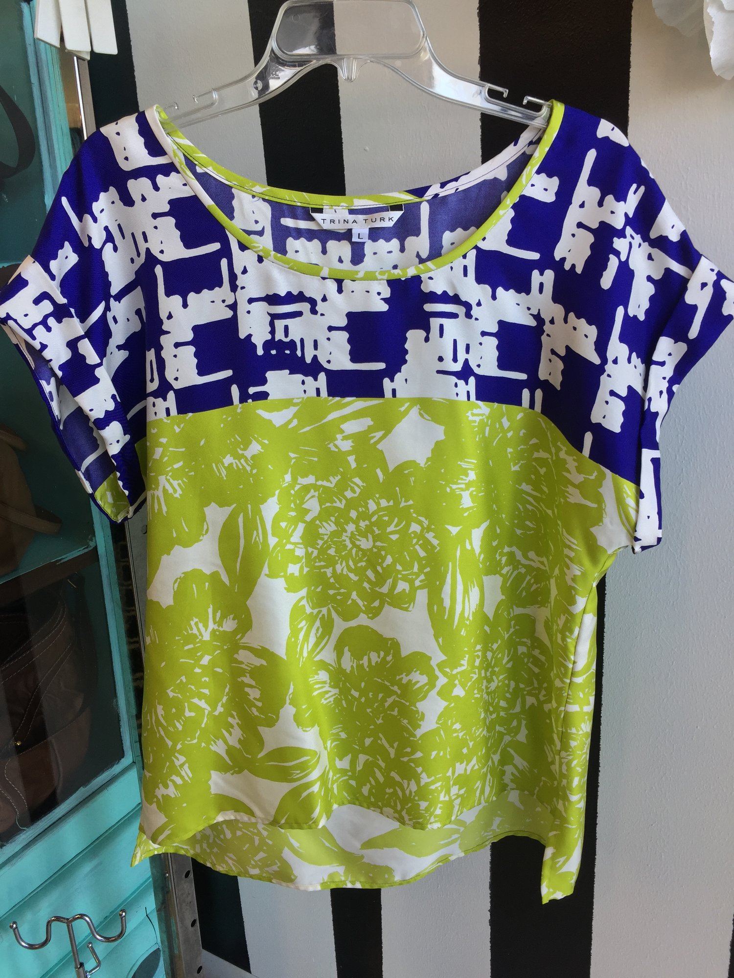Trina Turk short sleeved top, size large. Green, navy and white silk. Dry clean only. Like new, retail approx: $188