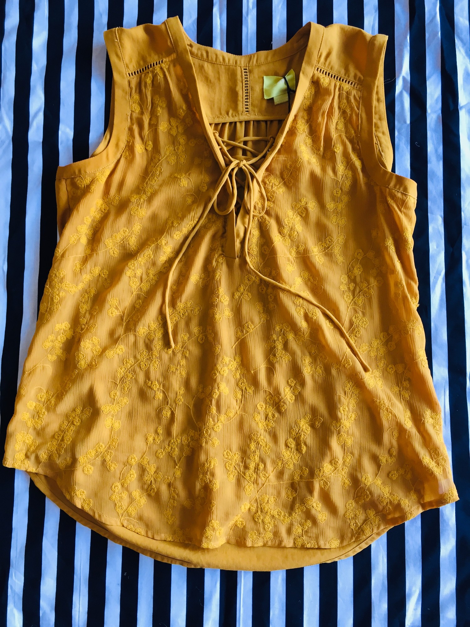 Maeve sleeveless top with detailed front. Lightly worn with no signs of damage. Made of cotton and polyester. Size 12; Yellow