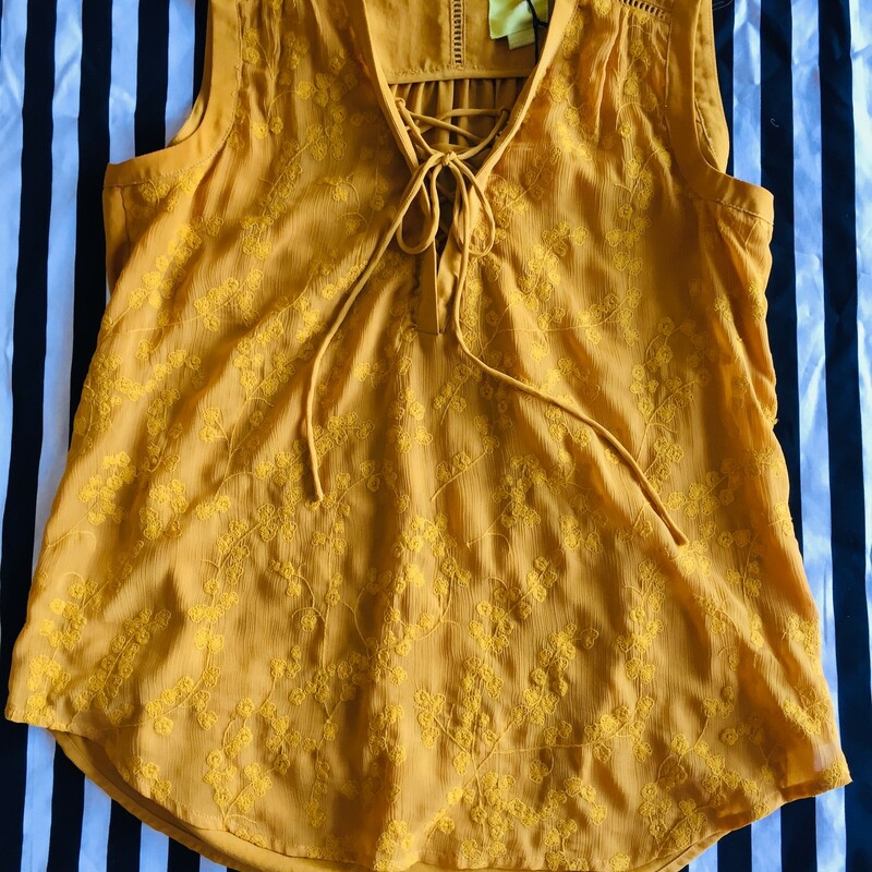 Maeve sleeveless top with detailed front. Lightly worn with no signs of damage. Made of cotton and polyester. Size 12; Yellow