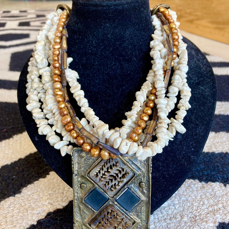 Cesaree Necklace: This one of a kind piece from Paris has beautiful detail and colors.  Natural stones and intricate medallion.  Ivory and citrine colors with bronze.
