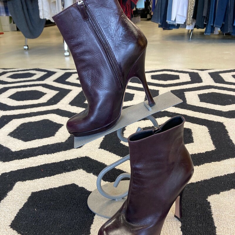 Prada Ankle Bootie: These eggplant colored Prada heels will never go out of style.  Beautiful color for fall.  Used and in great condition.  Size: 8