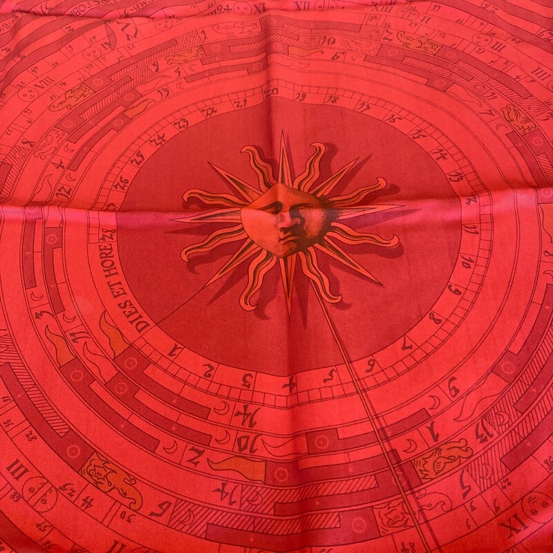 Hermes Scarf: Don't miss this great deal on this authentic Hermes scarf. It's in perfect condition with a  Zodiac pattern. Red.