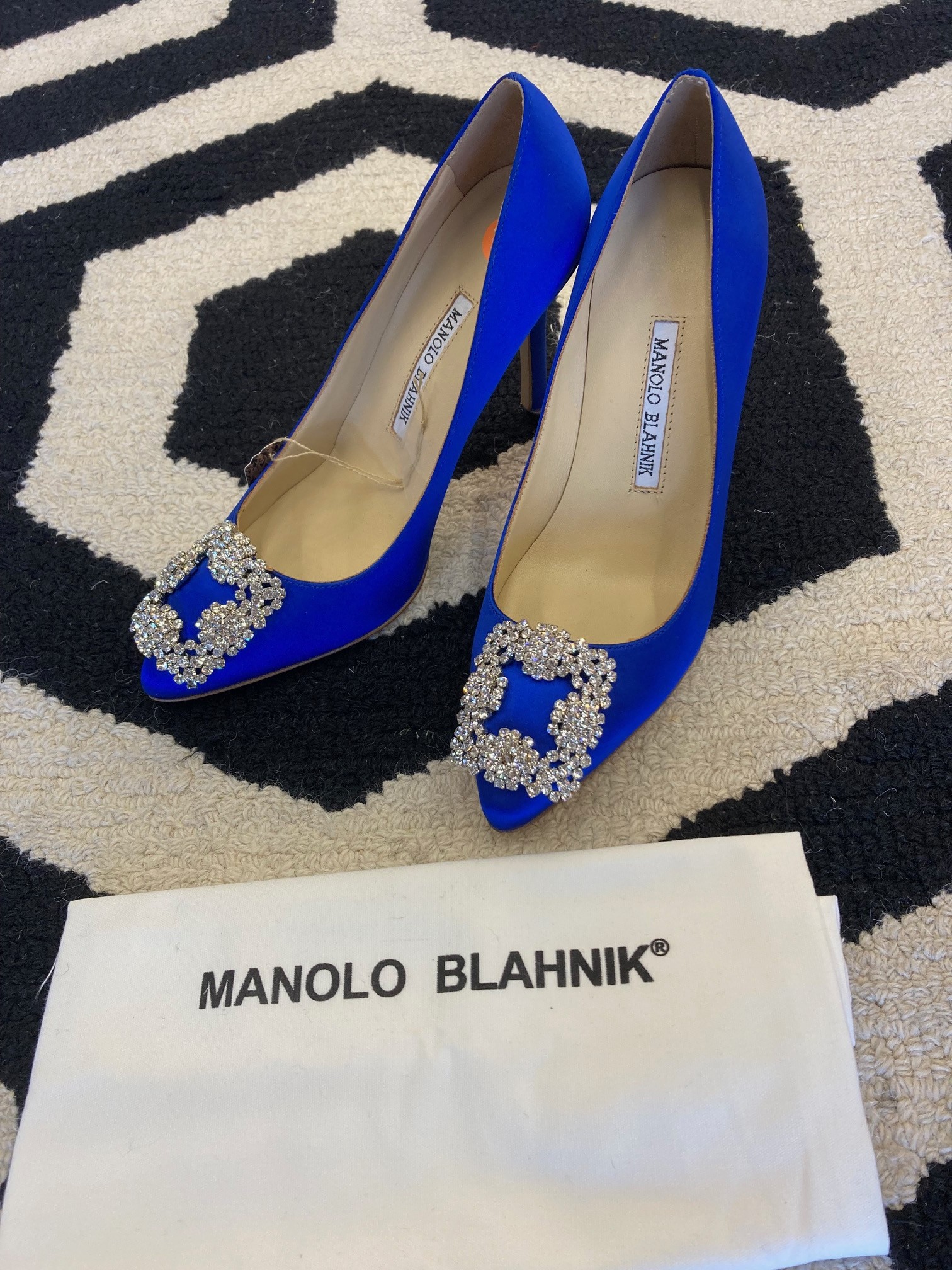 M.Blahnik: Beautiful in blue with bling! The perfect touch for your formal look. Looks like they have never been worn!  These are awesome faux heels.