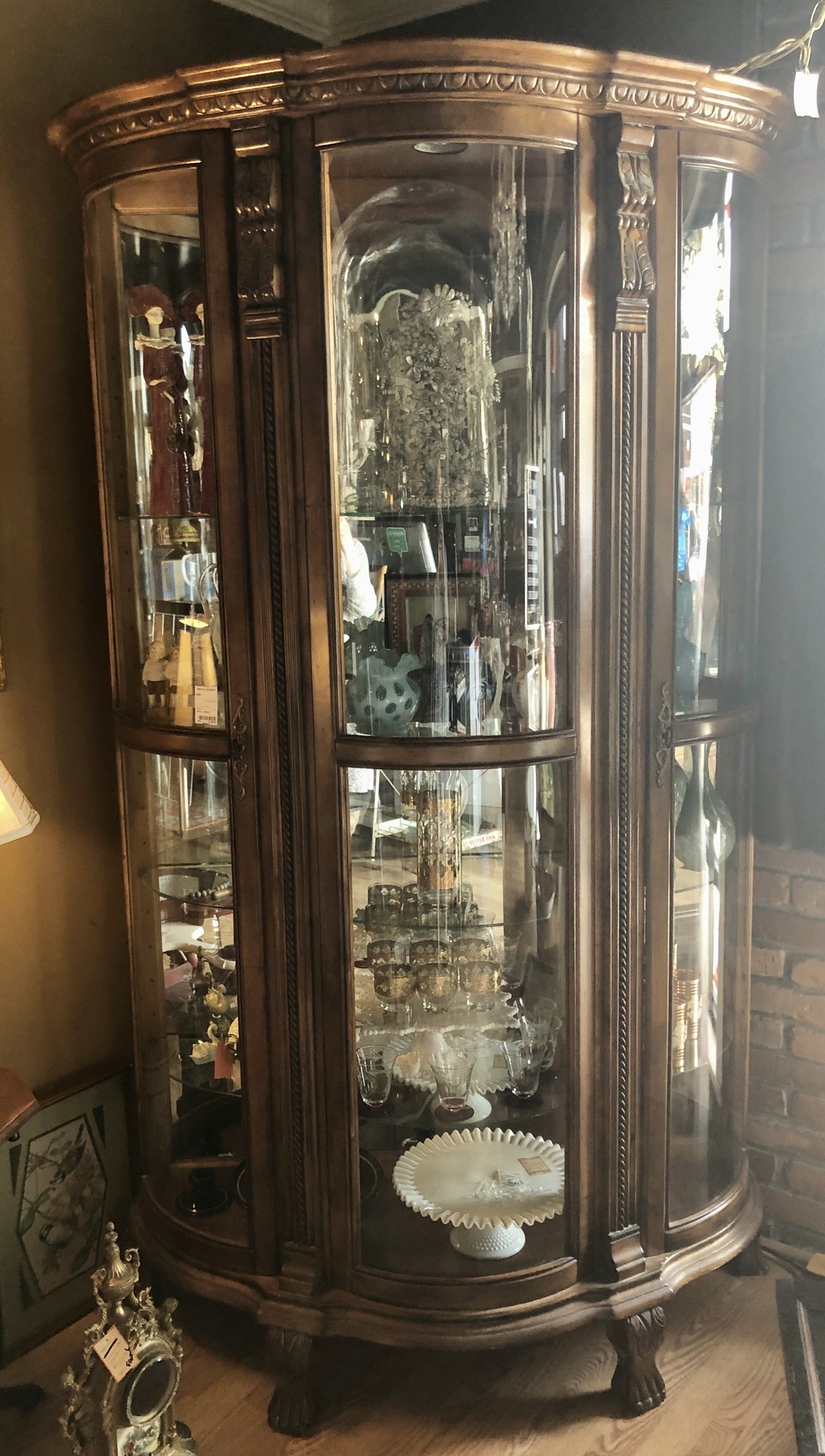Large walnut 2-door Curved Sides Curio cabinet. Available for in-store pickup only.