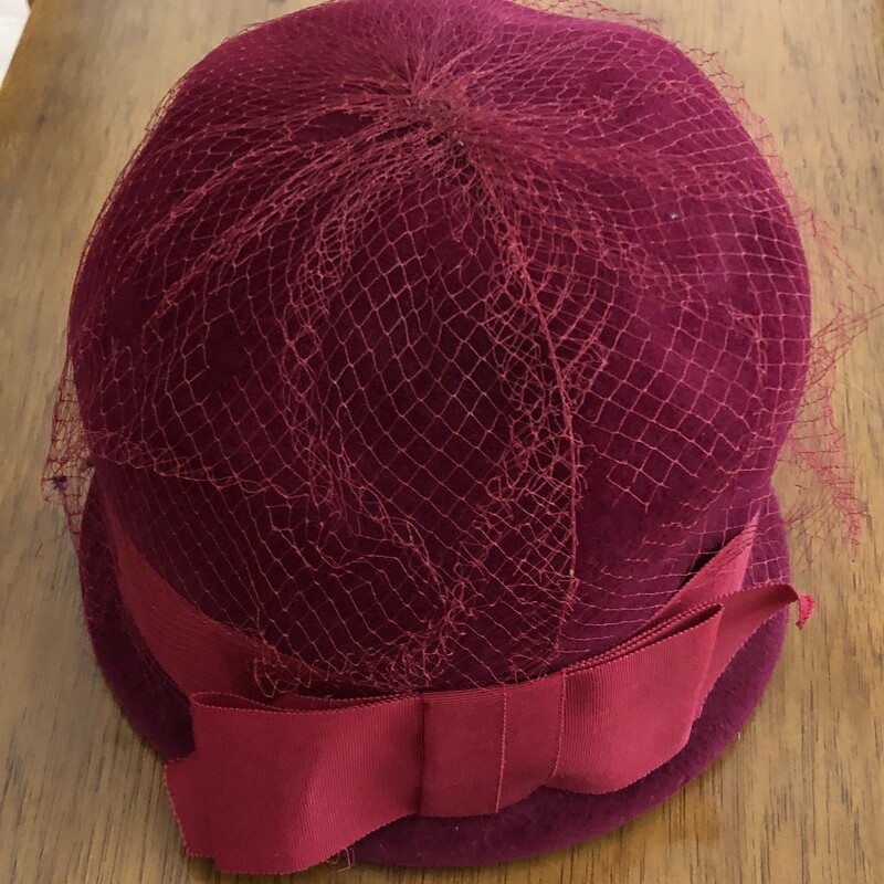 Velour Bowler Hat with netting. Burgundy, Size: 7in front to back  X 7in side to side. Some netting loss that doesn't detract from the beauty of this 1940s era hat!
