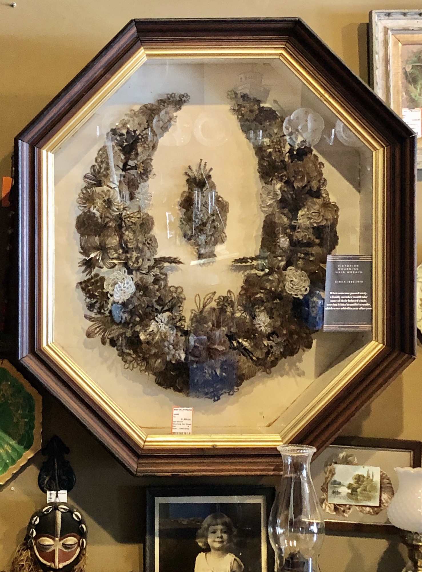 Mourning Hair Wreath. Large and museum quality in its original frame. Perfect for your Victorian decor. c.1880-1910.
Available for in-store pickup only.