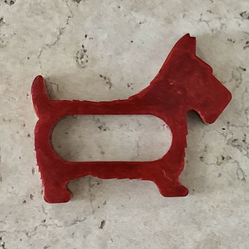 Awesome red Bakelite Dog Napkin Ring. Size: 2.75in. Great addition to your bakelite or dog collection!