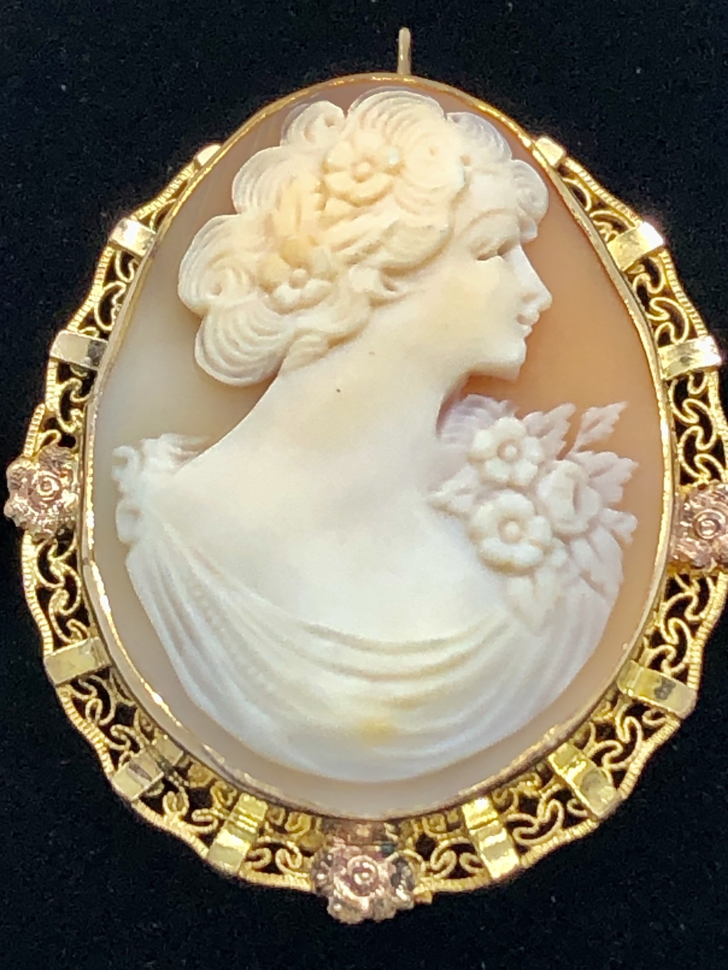 Cameo Brooch/Necklace, marked 1.200 12K (which is antique European GP).  Size: 1 3/4in. It can be worn as a brooch or a ring lifts up to put a chain through.

Will ship USPS Priority mail.
