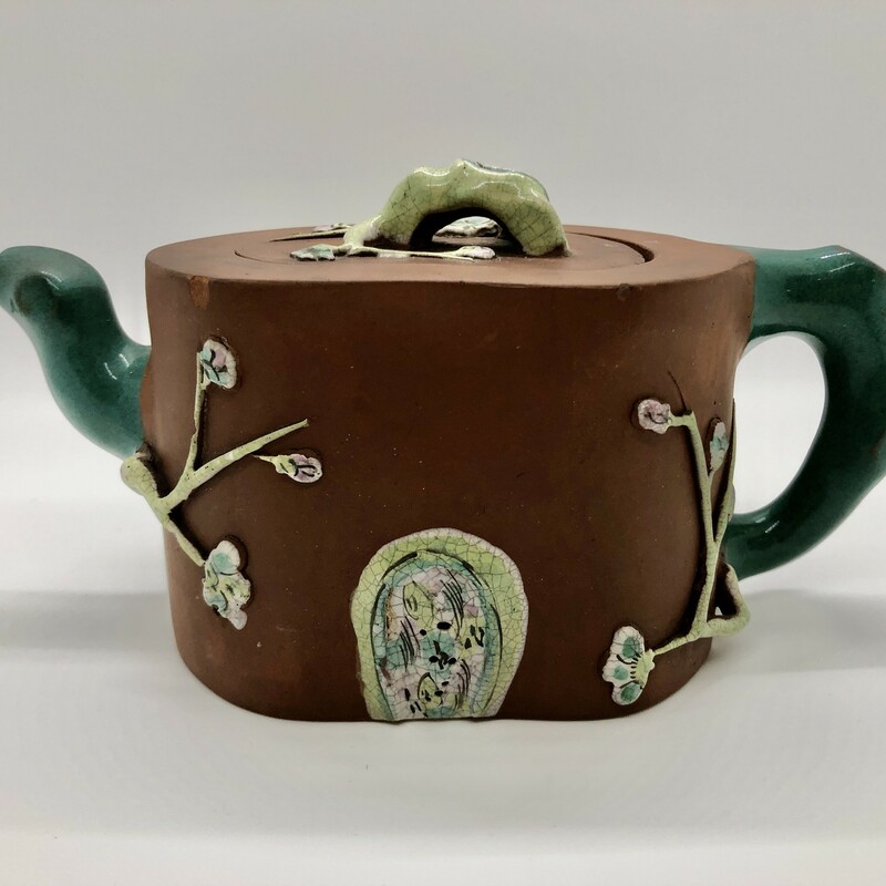 Antique Qing Dynasty Zisha Clay Signed Enameled Yixing Teapot 19th century. .
Beautifully crafted and enameled with a flowering prunus tree. Marked on bottom. Minimal enamel loss and a few flea bites on the lid.
Will ship priority mail