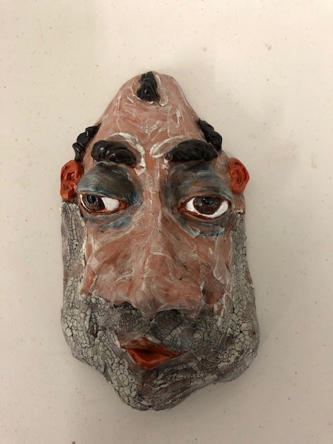 Title: Milhouse, None
Artist: Fred Freeman
Size: 5in w x 9in h
Medium: clay
Description: A clay mask caricature