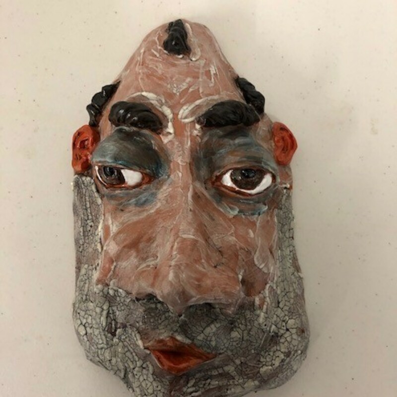 Title: Milhouse, None
Artist: Fred Freeman
Size: 5in w x 9in h
Medium: clay
Description: A clay mask caricature