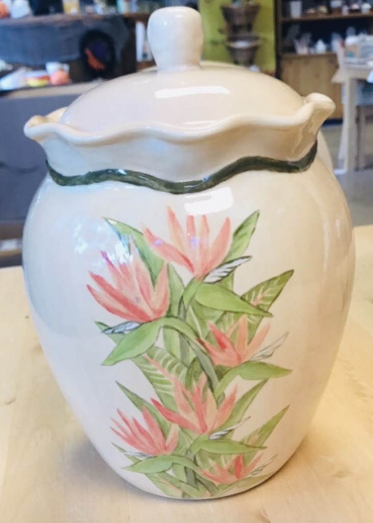 Title:Bird Of Paradise Jar/Vase
Artist: Tonya Hopson
Size:10 in height,, 6in depth, 7 in wide
Medium:Pottery/Clay
Statement: Hand painted pottery, Matching Set of 4 Coffee Mugs and Serving Platter available.