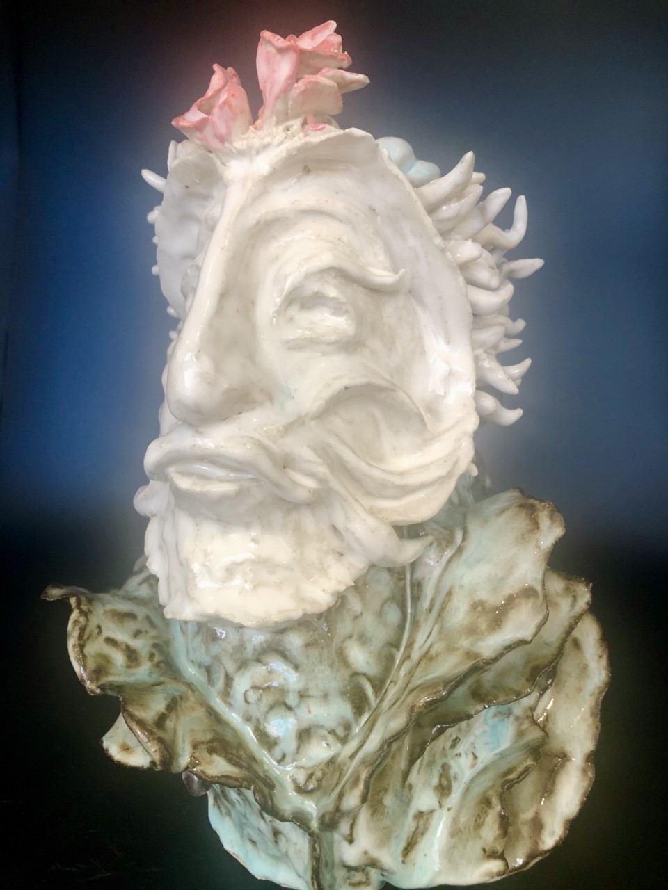 Title: Thereus
Artist: David Gwaltney
Size: 10x7x7
Medium: Clay
Statement: Ocean Reef Series...Hand built vase... Thereus, the mythical King and founder of Athens, He was challenged by KIng Minos of Crete to return his ring that he threw in the sea. He dived in a was lead  by a pod of dolphins to the Sea Goddess, Thetis. She gave him the ring and a jeweled crown. He returned the ring to MInos and kept the Crown for himself.