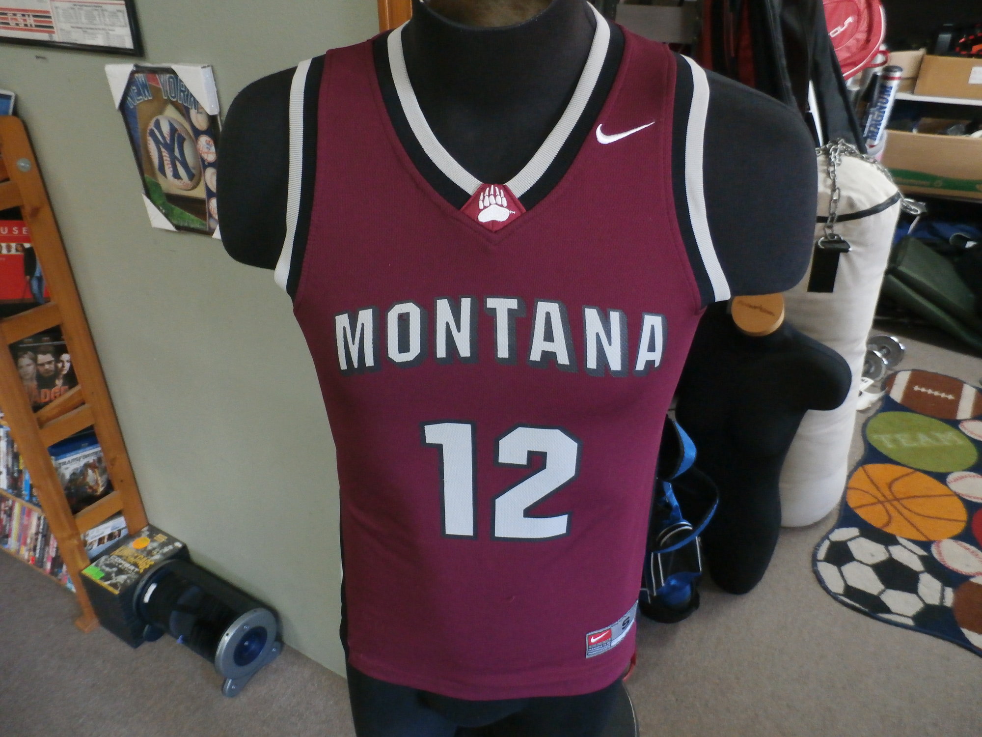 Montana Grizzlies Nike men's tank top Maroon size small #22839
Rating: (see below) 3- Good Condition
Team: Montana Grizzlies
Player: n/a
Brand: Nike
Size: Small- men's (Measured Flat: chest 17\", length 24\")
Color: Maroon
Style: sleeveless; screen printed
Material: 100% polyester
Condition: 3- Good Condition - some pilling and fuzz; some fading and discoloration; wrinkles; some stretching and wear from washing and wearing; screen printing is worn and faded; small rip in the \"O\" on the front; 3 dark streaks on \"2\" on the back (see photos)
Item #: 22839
Shipping: FREE