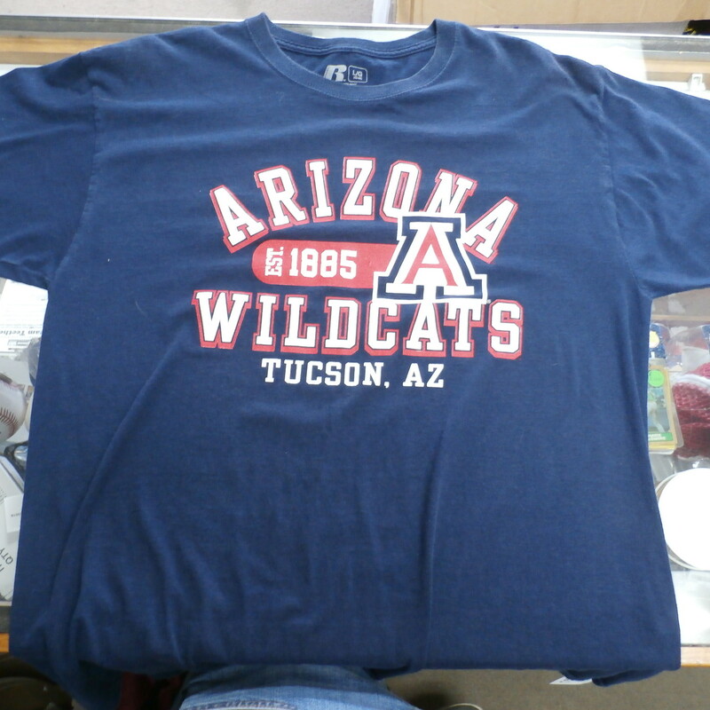 Arizona Wild Cats Men's Shirt Size Large blue cotton #22847
Rating: (see below) 3- Good Condition
Team: N/a
Player: n/a
Brand: Russell
Size: Men's - Large (Measured Flat: Across chest 22\", length 28\")
Measured flat: arm pit to arm pit; top of shoulder to the hem
Color: blue
Style:  short sleeve; screen pressed; shirt;
Material: 100%  cotton
Condition: 3- Good Condition - wrinkled; minor pilling and fuzz;
Item #: 22847
Shipping: FREE