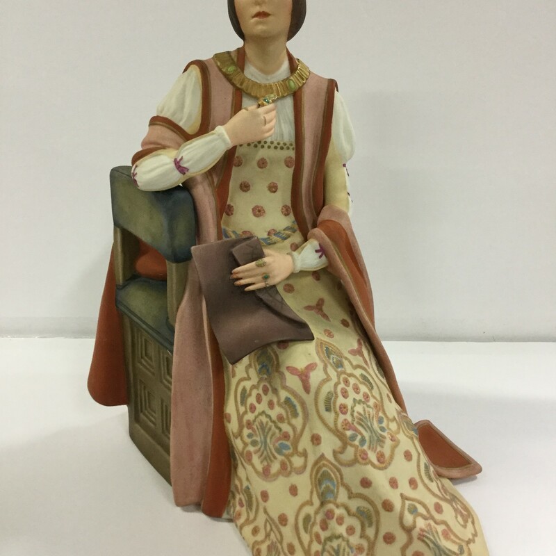 Beautiful Isabella seated; draped in jewels contemplating what might be written on the document she holds with her long; graceful fingers. Lovely floor length gown in shades of mauve; gold and blue.  Profiles in porcelain; Hutschenreuther made in Germany.  Signed by the artist.  Excellent condition!