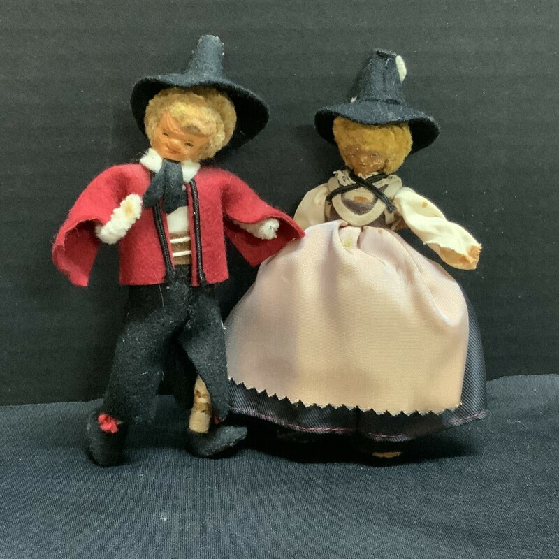 This is a set of two five inches tall pipe cleaner dolls. In fragile shape but oh so charming.