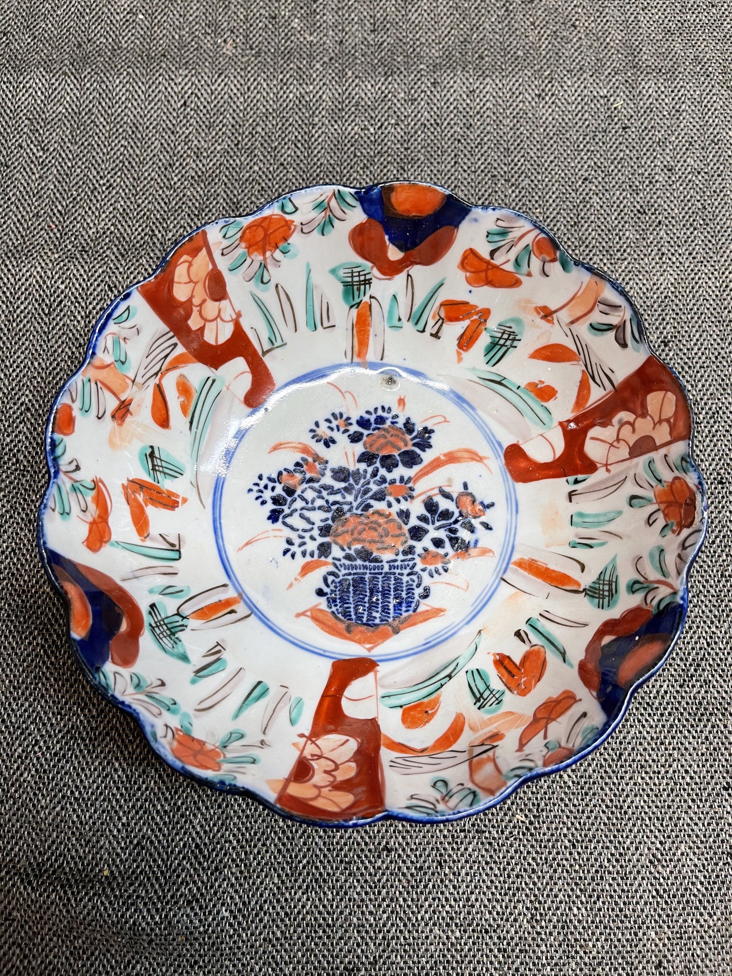 Small Imari bowl to hold your trinkets or display in a group. 6 inch diameter and 1 1/2 inches tall; this bowl is the perfect addition to your collection.