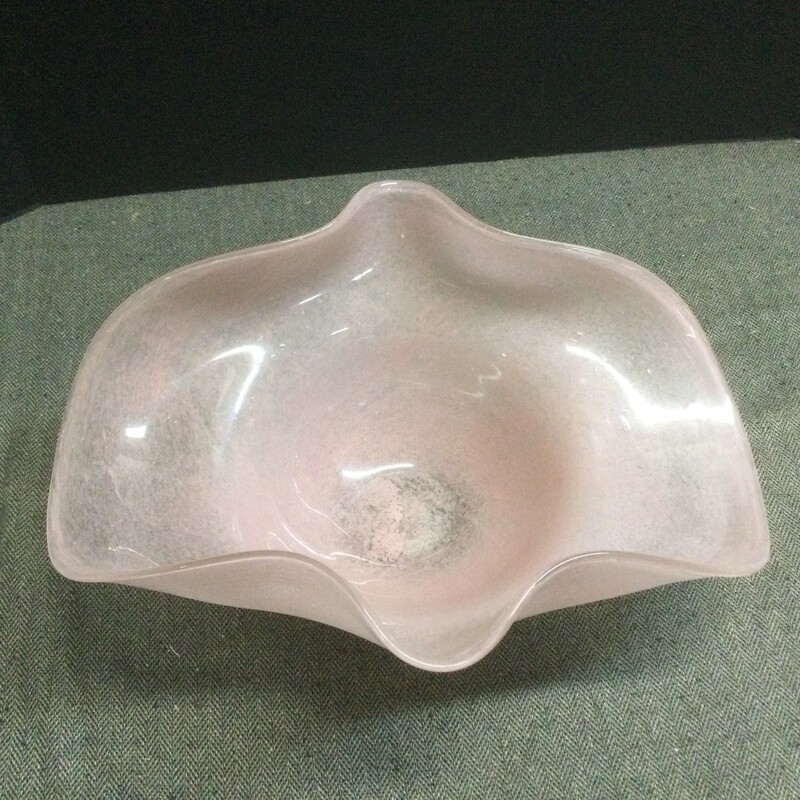 Wavy glass pink bowl at 15 1/2h x 12d. The 12 inch diameter will allow it to house a beautiful plant; succulents or floral arrangement.