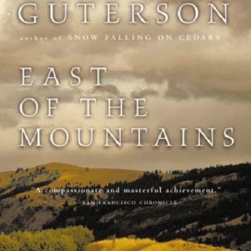 Paperback
David Guterson
East of the Mountains
Fiction Literature

Ben Givens is a retired heart surgeon who has been diagnosed with terminal cancer. Deciding to take charge of his own demise, Ben travels into the wild country of Washington state with his two dogs and his father's Winchester, to hunt one last time and then to end his life on his own terms. But, as with all quests, the Fates intervene. A car wreck introduces him to various helpers and hindrances, and gradually Ben undertakes a journey back through his own past. As he nears the apple-growing country in which he grew up, he recalls the signal events of his youth and manhood-especially his wartime experiences and his profound love for his wife of fifty years. Ben is transformed into an American Odysseus as he confronts the many sides of his own nature in a novel that radiates with the glories of the natural world and the mysterious permutations of the human heart.