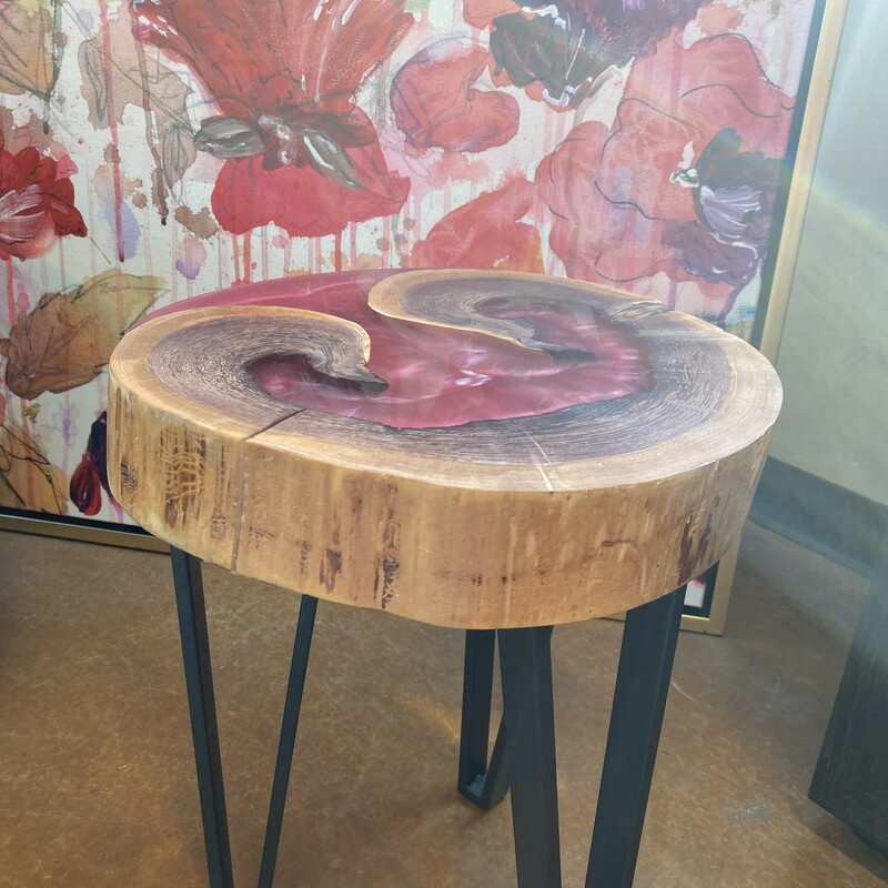 Redwood Rams Horn Side Table, Size: 14x14

The wood from this table came from a redwood tree cut, along with hundreds of other trees, as the result of the Santa Cruz CZU fire of 2020.  The log's center had rotted and then burned during the fire forming a C shape.  The artist calls it a Ram's horn shape.  The center has been filled with rose red epoxy.