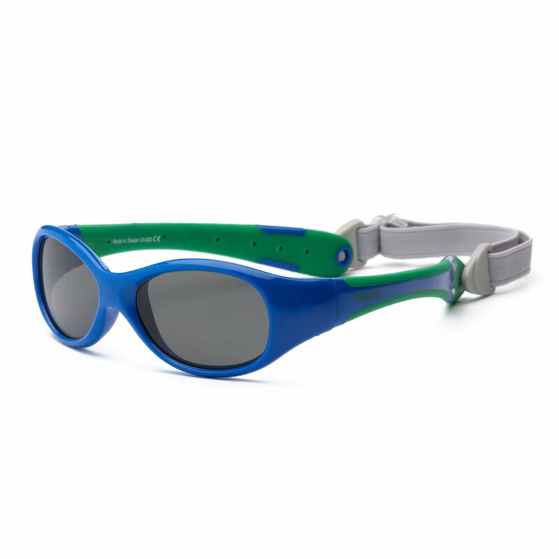 Real Shades With Strap, Blue, Size: Baby 0+
Toddlers are prepared for any adventure when they are wearing their Explorer sunglasses! A wrap around frame minimizes exposure to peripheral light while the soft, adjustable strap ensures these glasses will be comfortable and stay put. Explorer is also available with P2 technology, providing both polarized and polycarbonate lenses.

Features:
Unbreakable
100% UVA/UVB Protection
Sized to Fit
Wrap Around Frames
Shatteproof Polycarbonate Lenses
Flex Fit
Removable Band
Flex Fit, Wrap, Banded
Flex-Fit frames, made of TPEE, a rubber like material that bends and twists but does not lose its shape. Polycarbonate lenses. Lead-Free, No Bisphenol-A, No Phthalates