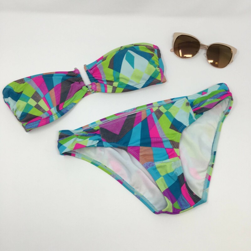 103-221 Kirra, Multicolor, Size M. 2 piece. Geometric aqua and green pattern bandeau style strapless top, with cute U shape joining hardware, and soft removeable cups. bikini bottom is classic low cut with ruche side fabric.  suit is fully lined, 80% nylon, 20% spandex, hand wash cold no bleach line dry in shade Made in Vietnam