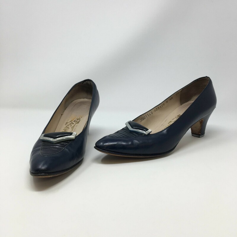 110-176 Ferragamo, Navy  Size: 8A
Women's pump slip on heels - blue leather heels with a stone in the front n/a  good condition