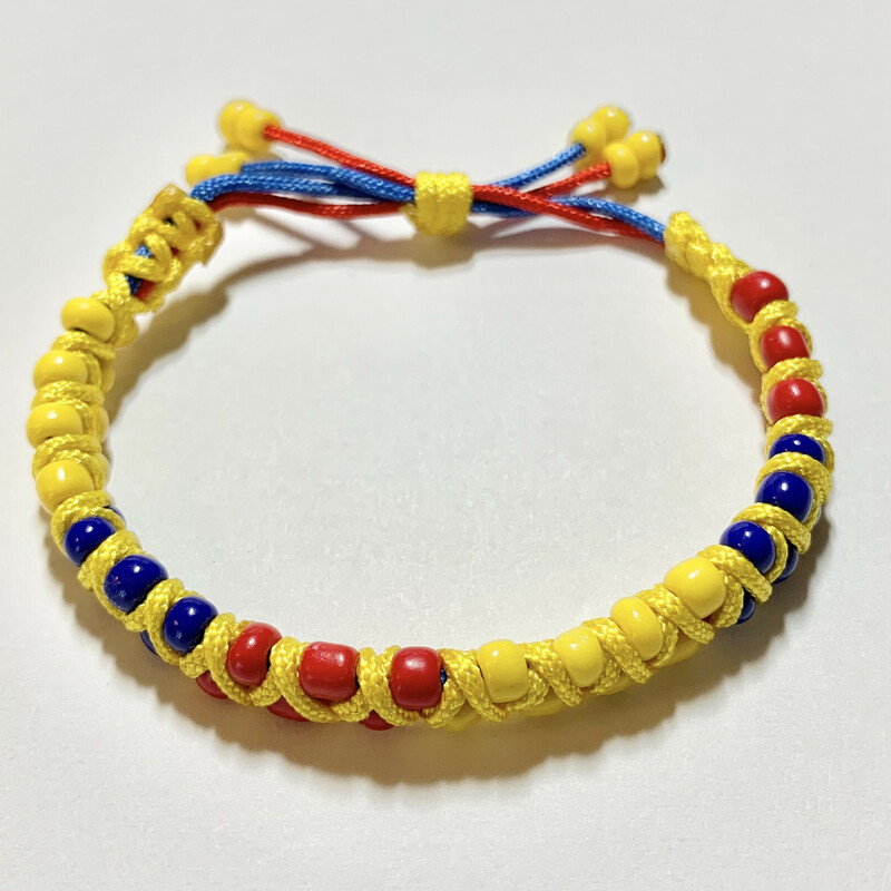 Chakirasnnylon Br0043-ybr, Yellow-b, Size: Bracelet
Yellow-Blue-Red Chak. - Yellow Nylon
4mm Rocaille Beads - Silk Nylon Cord