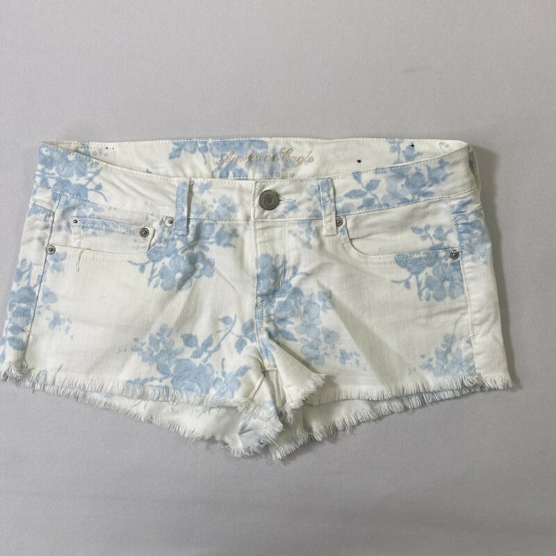 100-183 American Eagle, White, Size: 10 white fringe jean shorts with blue flower pattern